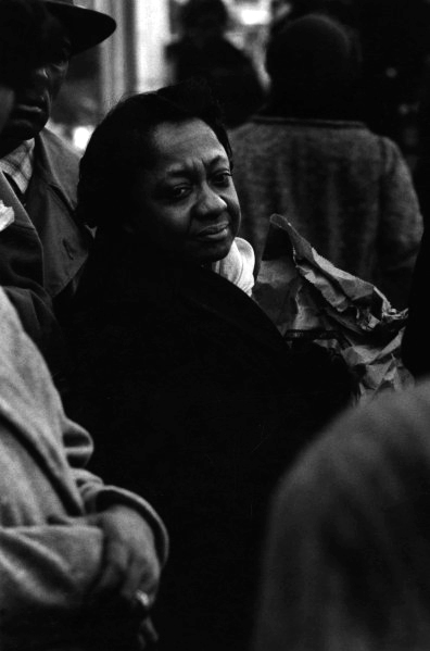 [Woman in crowd], c. 1965